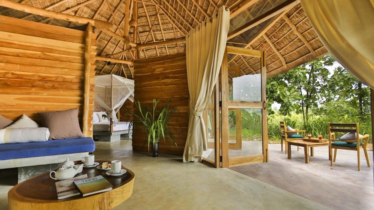 Thatched bungalow at Gal Oya Lodge