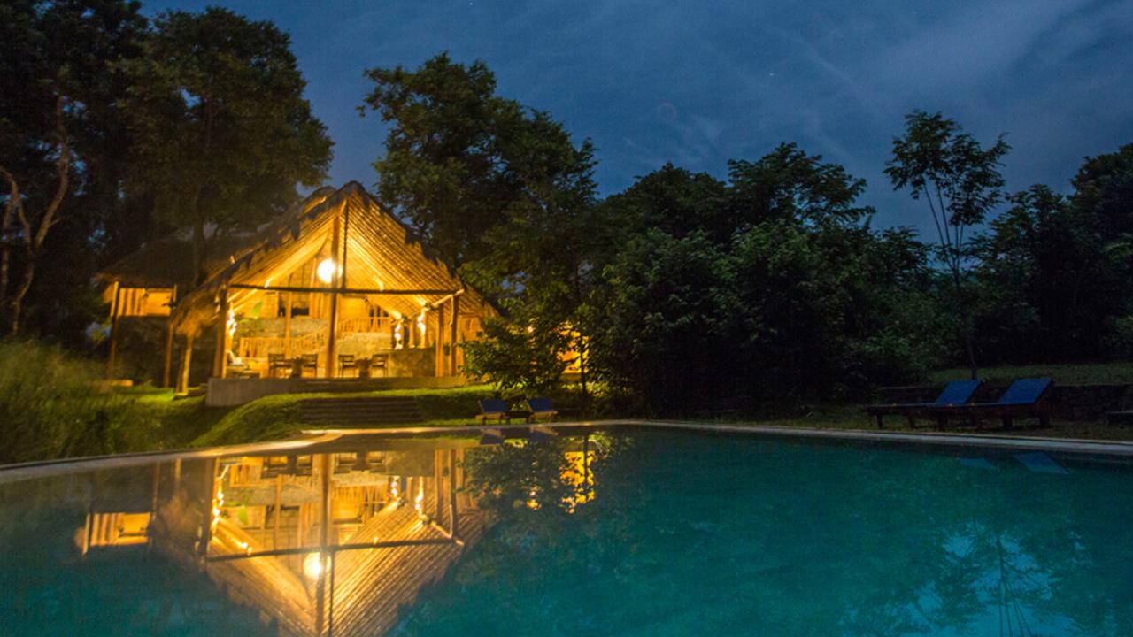 Swimming pool at night at Gal Oya Lodge
